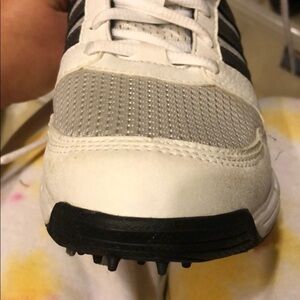 Adidas white and silver traxion cleats size 4